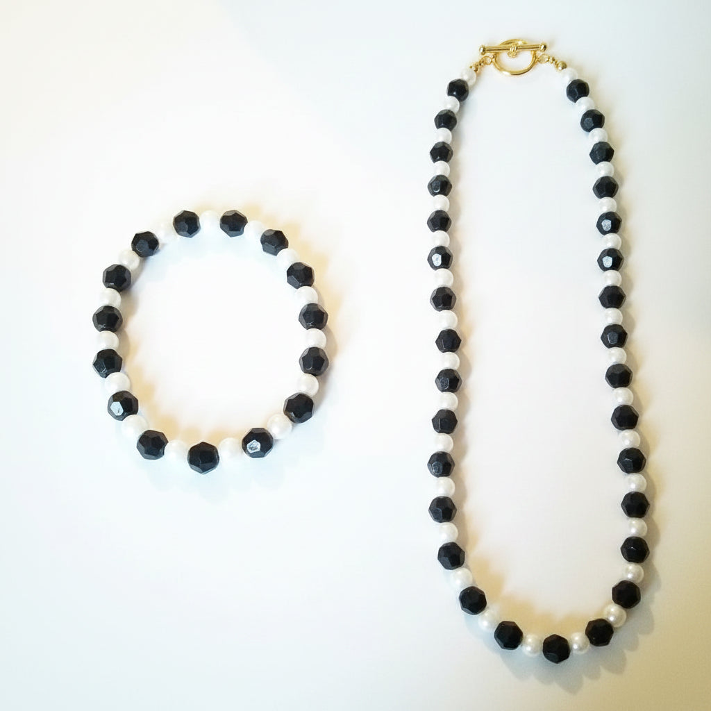 Black and white beaded bracelet on a light background