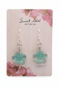 Pair of earrings on a 'sweet love' card with floral design