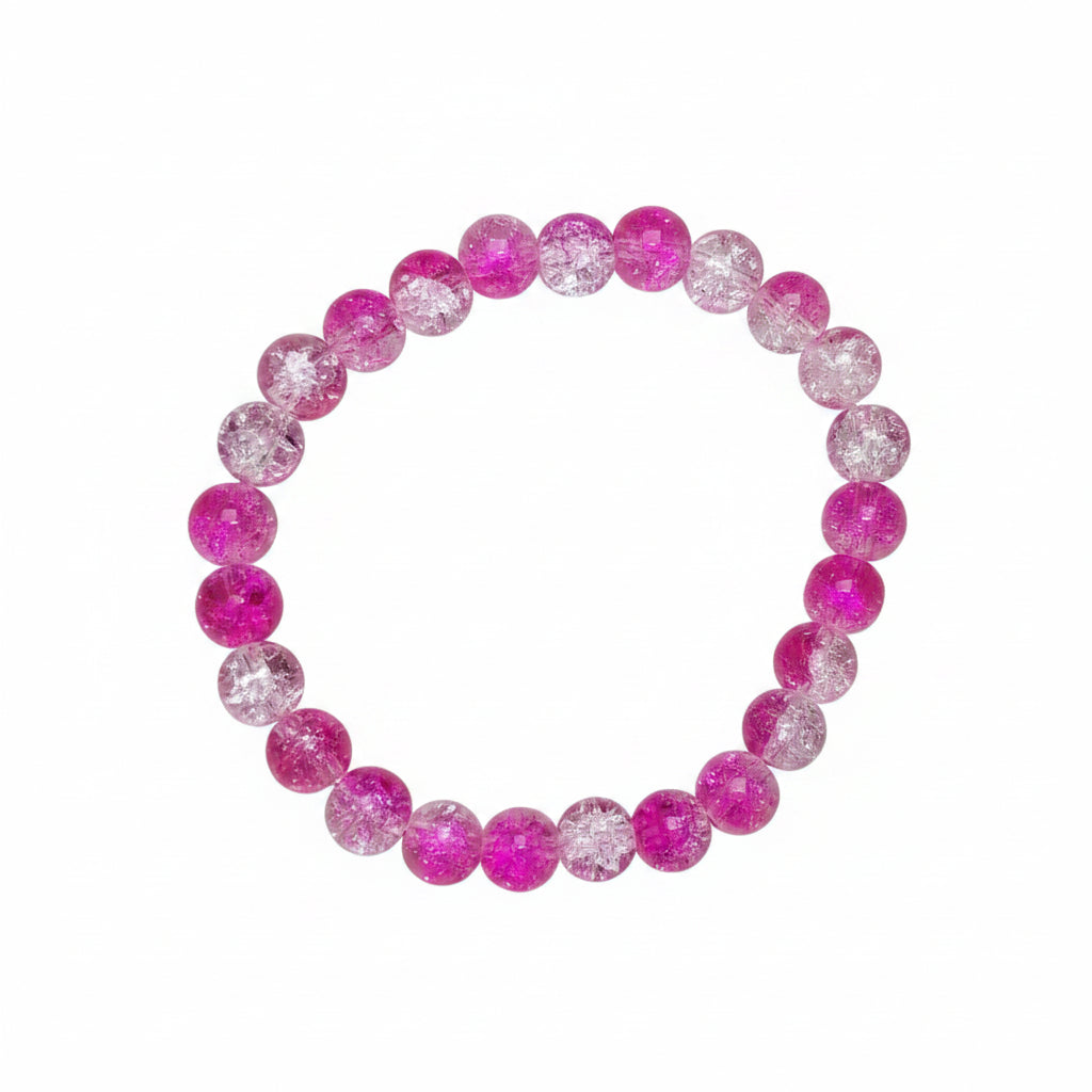 Pink and clear fusion beaded bracelet on a gray marble surface